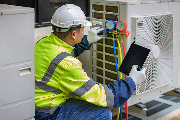 Professional Heat Pump Repair technician working in Bates City, MO